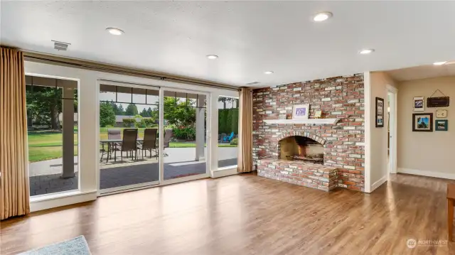 Extend your living space to the entertainment sized partially covered patio.