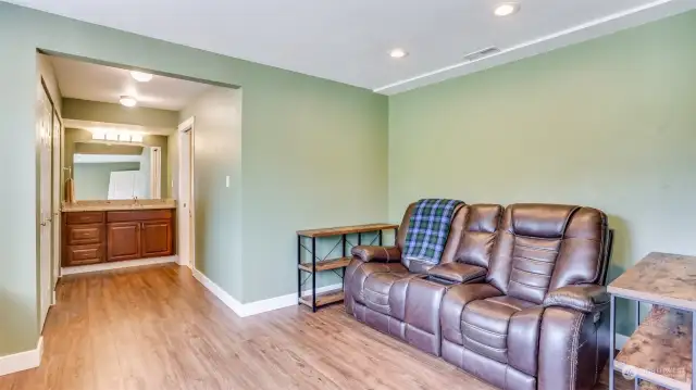 Another view of the lower guest bedroom leading to the jack and jill bathroom connecting to the bonus room.