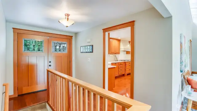 Enjoy double door entry and step inside to gleaming hardwood floors throughout most of the main level.