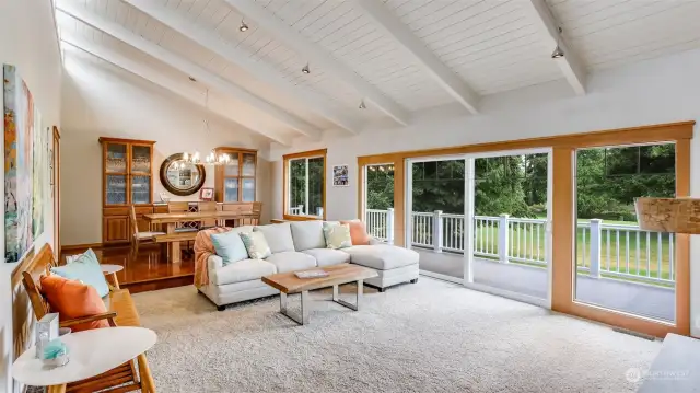 Living room is open to the dining room and offers direct access to the expansive back deck making this an ideal space for entertaining.