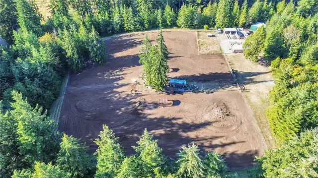 Located in the McKenna Forest Reserve on 21 acres. This property is Equestrian ready. Separate driveway from the home site to the horse pastures and paddocks. Photo is the "Horse Area of the 21 acres".