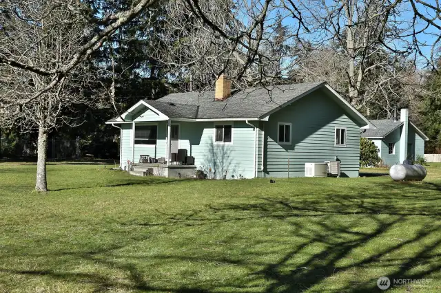 Whole house generator for power outages.  The propane tank is purchased, not leased, and conveys with the sale.