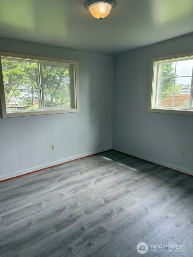Larger bedroom fits a queen bed