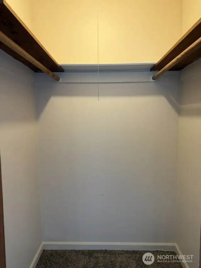Larger bedroom walk in closet