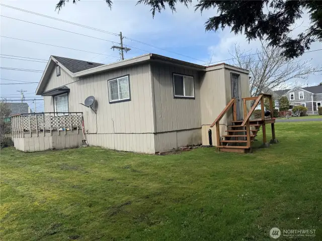 Southeast corner back side of house