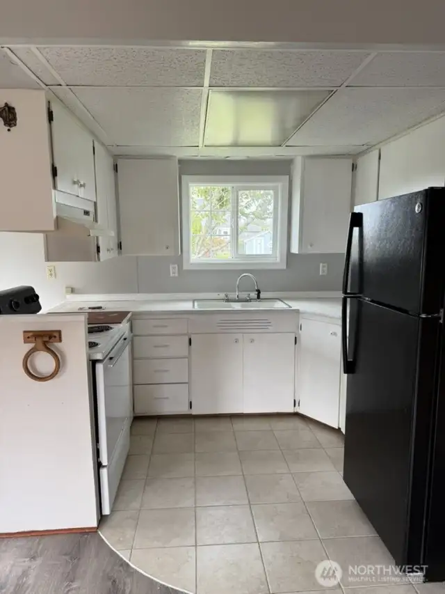 Kitchen with fridge