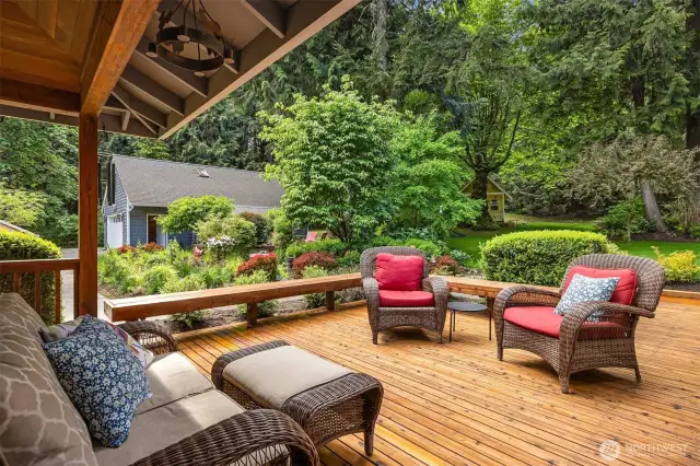 Deck of Kitchen w Detached Garage and Studio in background