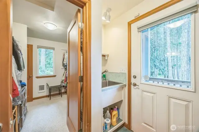 Walk in Closet from the primary bedroom to bath & laundry room.