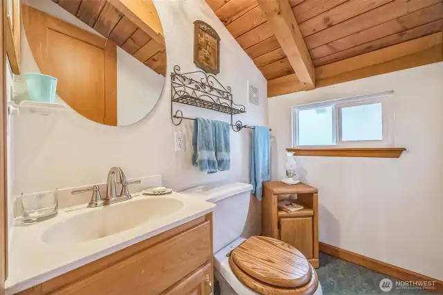 Upper level half bathroom.