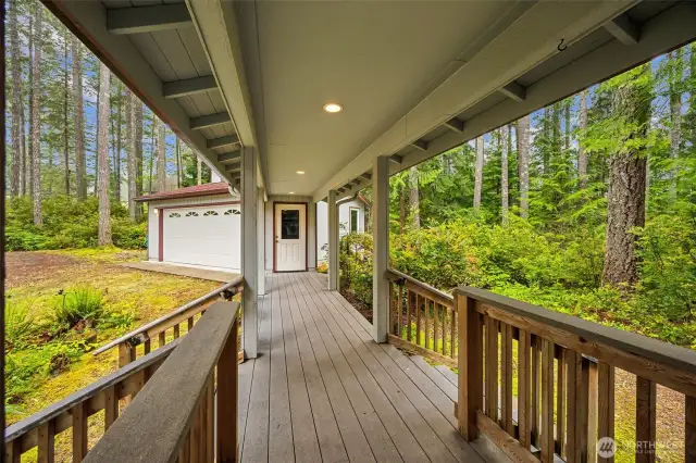 Covered breezeway connecting house & garage with recessed lighting!
