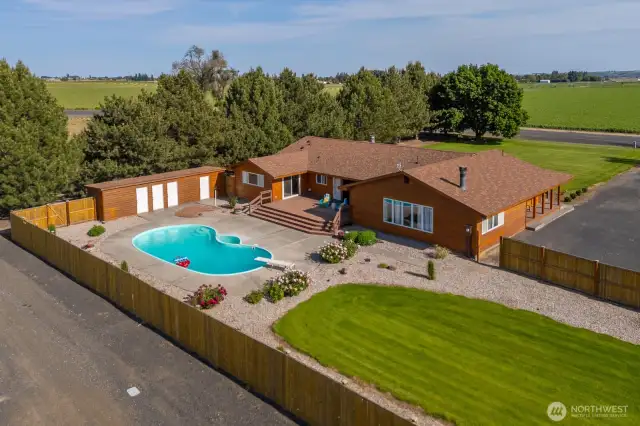 Fenced backyard, in-ground heated pool