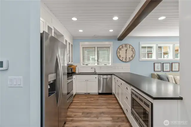 Kitchen with huge peninsula with seating