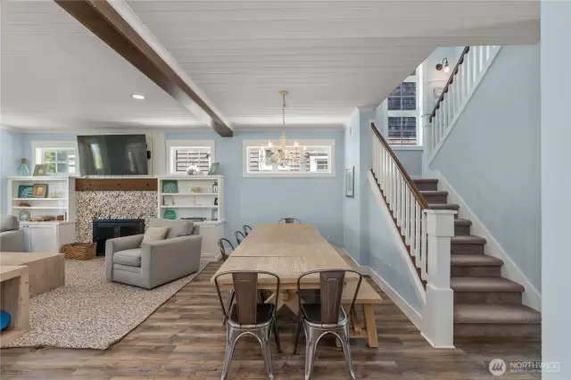 Dining area with stairs to upper level