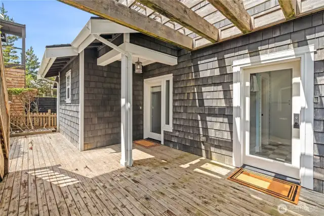 Patio area on N Glen side of home, entrance to mudroom