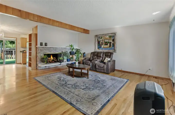 From the living room out to the dining room and kitchen.