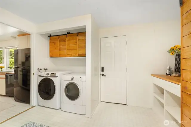 Laundry area with custom panty area.