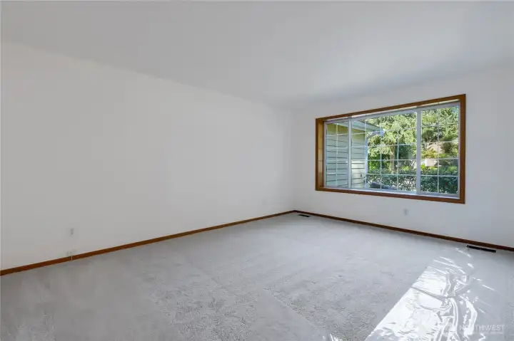 Living room looks out to gorgeous front yard