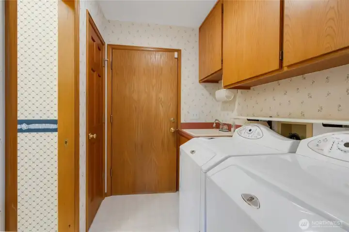 laundry and 1/2 Bath off garage access