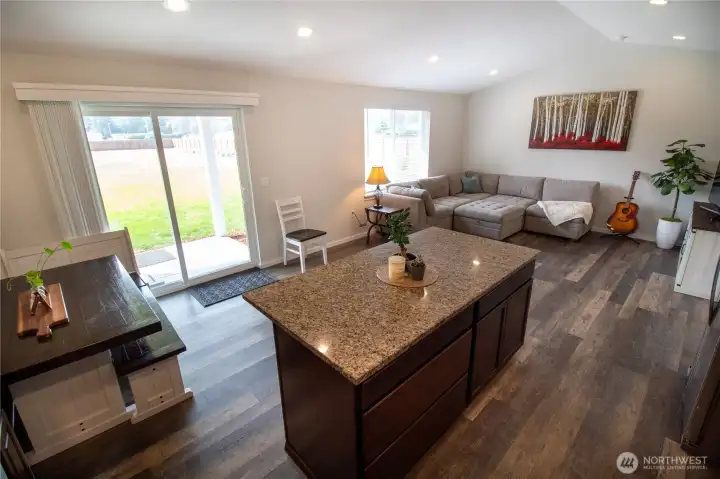 The kitchen flows into the dining room, living room and covered patio!