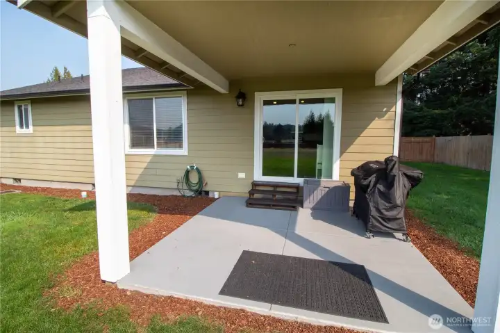 Entertain or relax year-round under the covered patio.