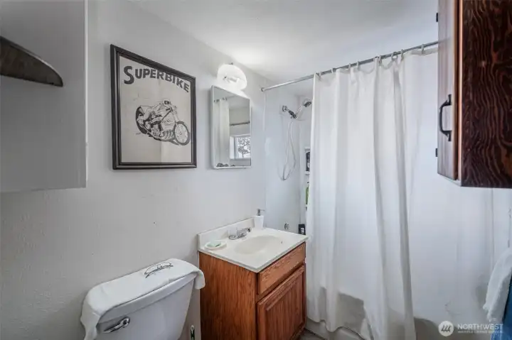 Bath with tub and shower