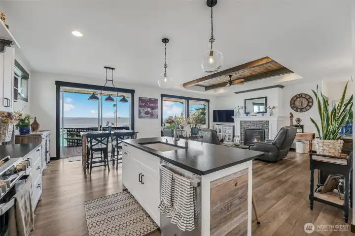 Views can be enjoyed from the kitchen, dining and living rooms.