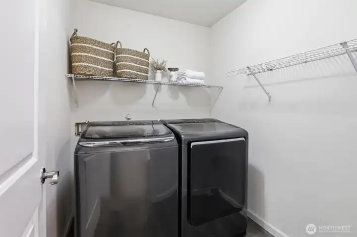 Laundry room on upper level.