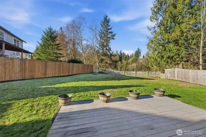 Large fully fenced yard backs up to a protected greenbelt.