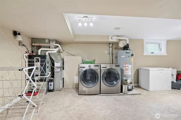 Next to large basement Bonus room is a giant sized laundry - to the right it an equally large storage area but you can't see it in this photo.
