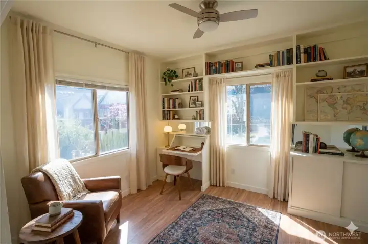 AI generated photo showing office/den space off of kitchen AI generated photo showing office/den space off of kitchen