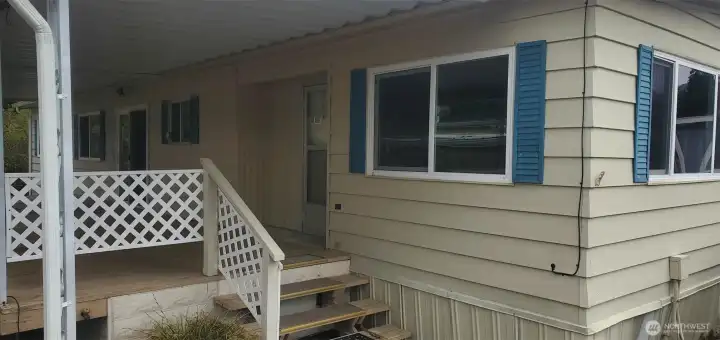 Covered Front Porch. Front Door into the Living Room