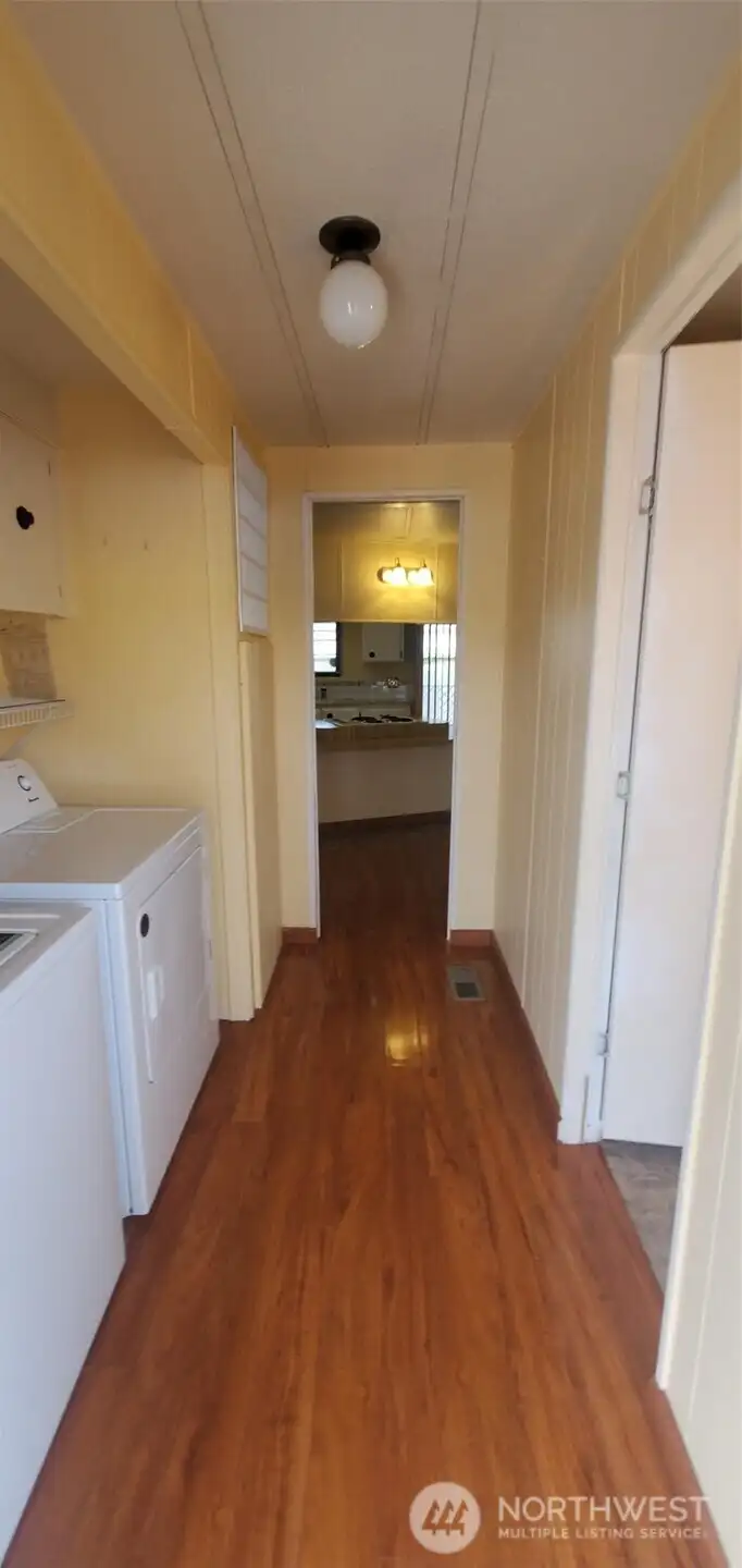 Laundry Room Entry. Main Bathroom to the Right