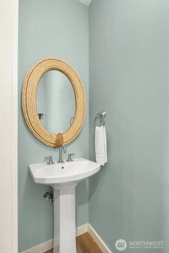 Updated powder room with stylish details. Updated powder room with stylish details.