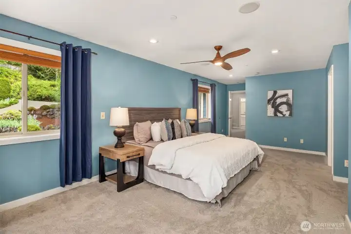 The spacious primary suite can easily fit a king-sized bed (not shown) and has new carpet found throughout the upper level. The spacious primary suite can easily fit a king-sized bed (not shown) and has new carpet found throughout the upper level.