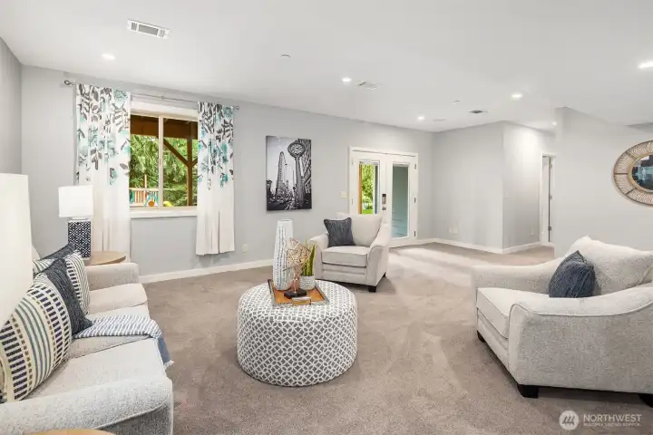 Another view of the spacious lower level bonus room. Another view of the spacious lower level bonus room.