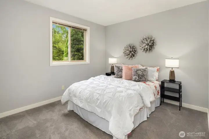 This lower level room makes a great bedroom with the large, sunny window and nice closet. This lower level room makes a great bedroom with the large, sunny window and nice closet.