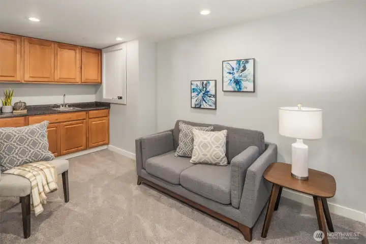 The extra finished room in the lower level with a sink — great for a gym, hobby room, or additional storage. The extra finished room in the lower level with a sink — great for a gym, hobby room, or additional storage.