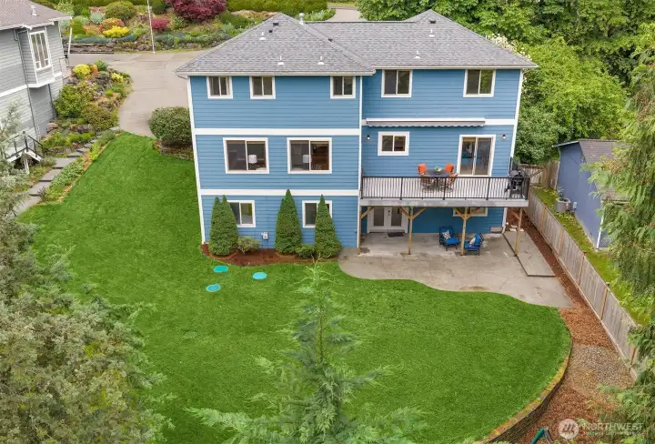 The home's multi-level outdoor spaces offer plenty of room to play, relax, and entertain. The home's multi-level outdoor spaces offer plenty of room to play, relax, and entertain.