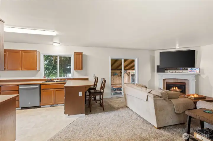 Kitchen and family room taken from the entrance area from garage