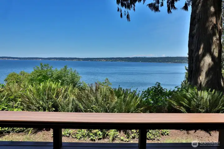 View from the deck which has a built in bench. Migrating gray whales love to feed in the waters below. During the spring months you can hear the spouting of the whales.