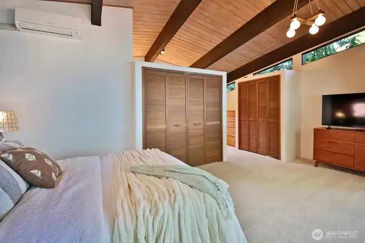 Plenty of closet space with built-in dresser. Let's check out the full bath located on the other side of closets.