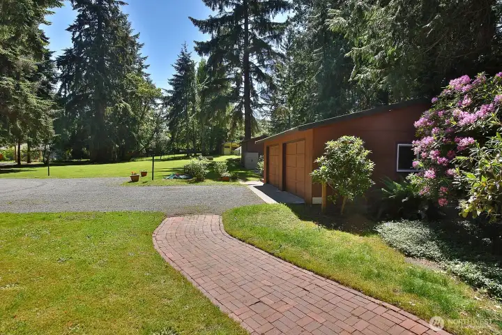 View as we head out to explore the expansive yard. There is a shed on the property that does not convey.