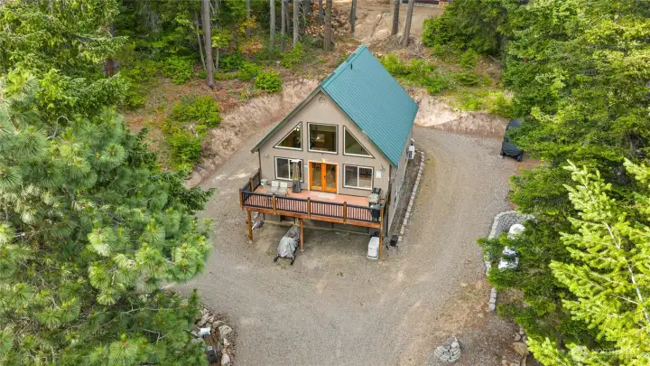 Nestled in the trees, this fantastic weekend retreat awaits!