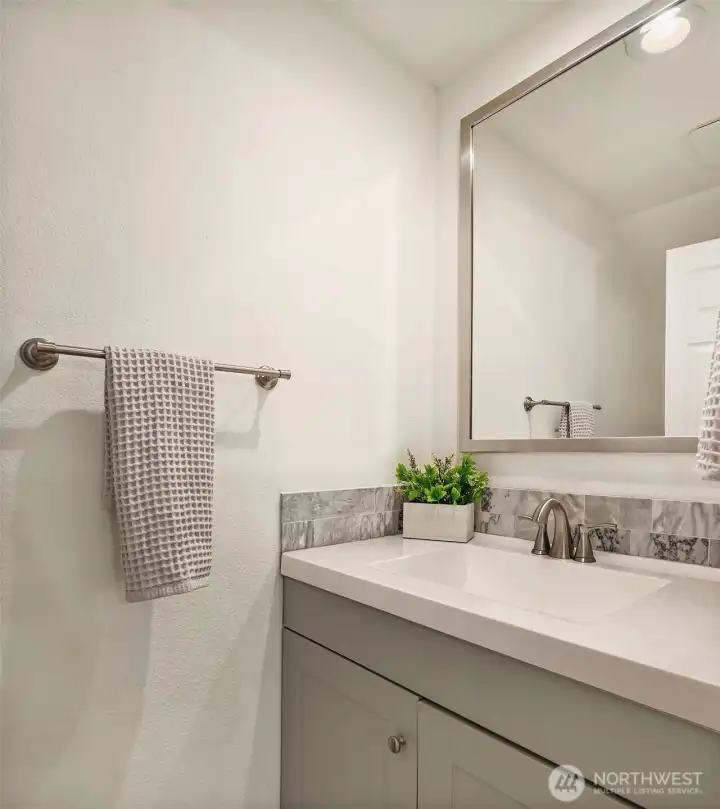 Remodeled powder room on main floor. Remodeled powder room on main floor.