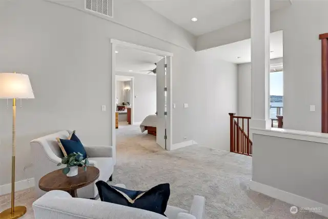 From the primary bedroom it is an easy jaunt to the lower level where you will find even more spaces to relax, entertain or work. The possibilities are endless.