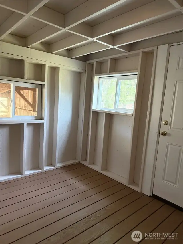 Enclosed porch off primary suite