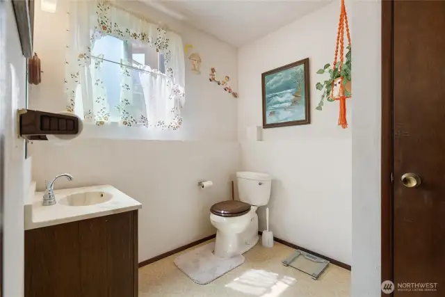 Off the side of the hair salon is a half bath.  You could remodel this space to be a full bath.