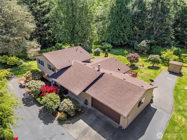 Aerial shot of the rooflines- it's clean!  Note all the flowering shrubs and trees within your view