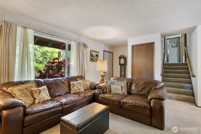 Entrance in the corner, delivers you right into the living room.  This tri-level has just 8 steps to the bedrooms and bathrooms