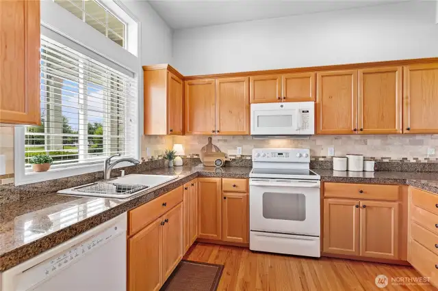 Light and bright with tall and vaulted ceilings throughout.